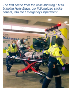 A scene from the case showing a masked woman on a stretcher being transported by two EMTs. There are two ambulances in the background.