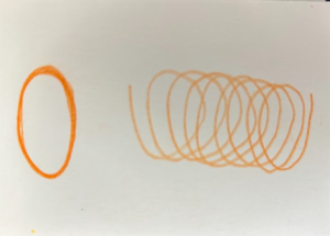 Image of orange oval and orange spiral next to each other on white background