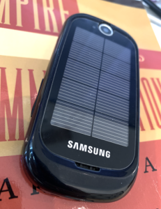 Samsung Blue Earth solar phone, circa 2011. Howard Innis's Empire and Communications for a suggestive backdrop