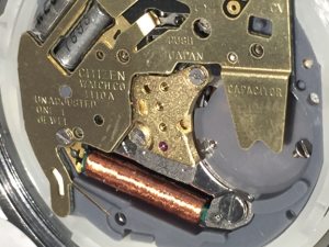 Citizen 1980s watch movement 4110A, showing the location of the storage capacitor.